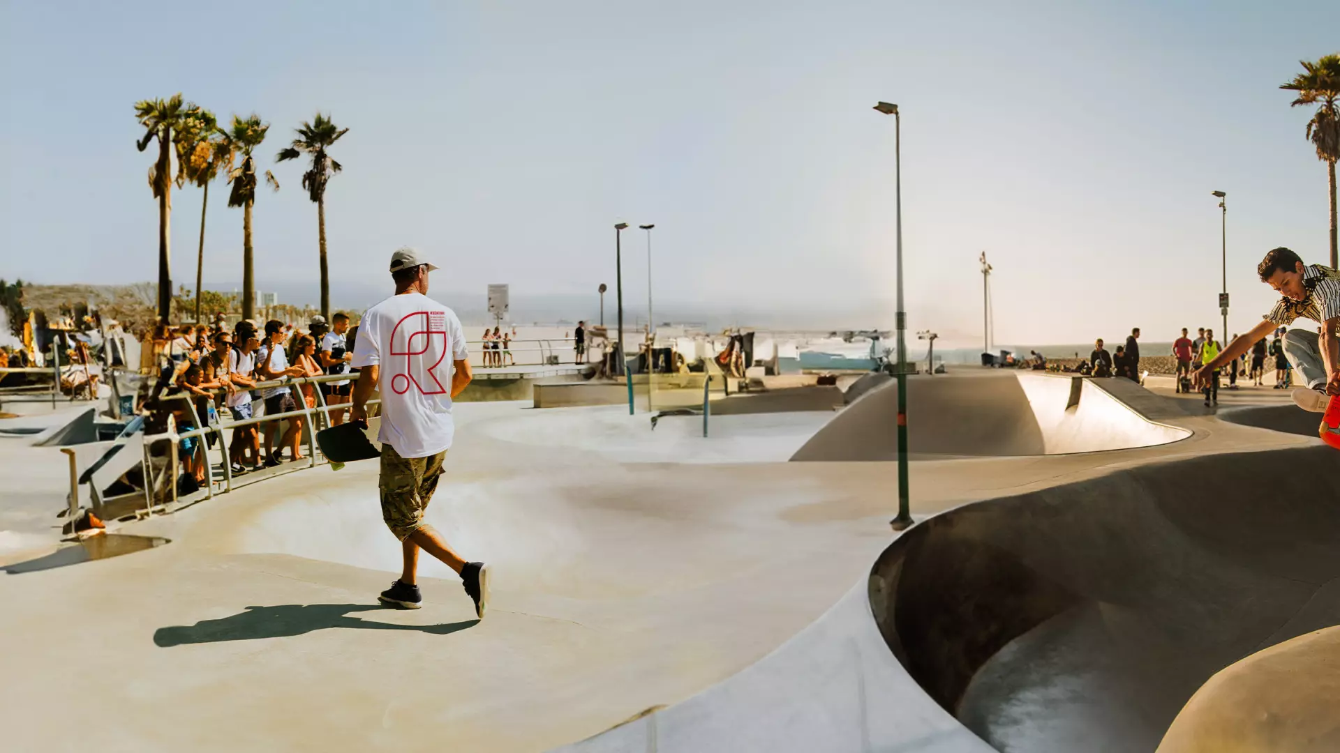 Redkiwi header our culture. Men in skateboarding park wearing Redkiwi t-shirt.